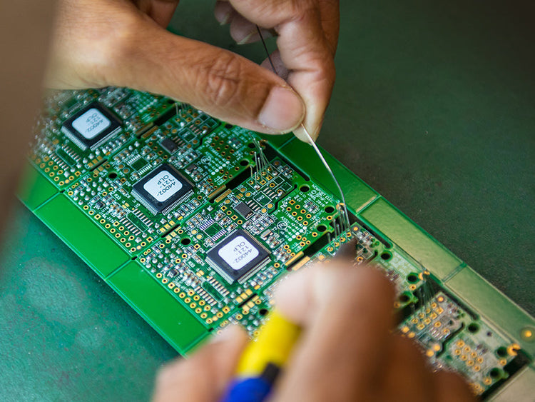 electronic, assembly, bonding, the person is doing assembling of PCB